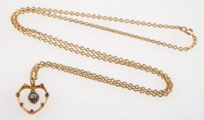 An antique acrostic diamond and gemstone heart pendant with chain,