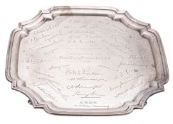 A George VI silver salver, of shaped square outline with incurved corners and a moulded border,