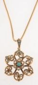 An opal pendant and snake chain,