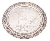 A late 19th/ early 20th century Chinese silver salver, of circular form,