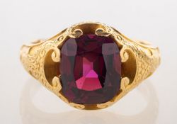 An ornate almandine garnet ring, claw set with a rectangular mixed-cut almandine garnet, garnet,