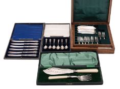 Four various cased sets, a set of eight pairs of fish knives & forks (lacking their handles),