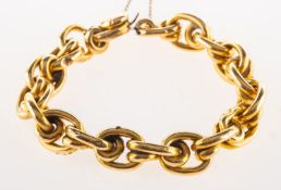 A fancy link bracelet, of oval hollow twisted interlocking links, push-in clasp, safety chain,