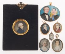 A group of seven antique ivory portrait miniatures,