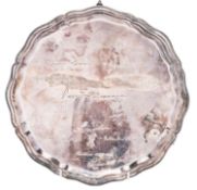 An Elizabeth II silver salver, shaped circular outline,