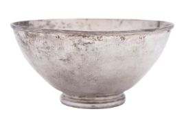 An Elizabeth II silver bowl, circular form, with a reeded border and a spot-hammered finish,