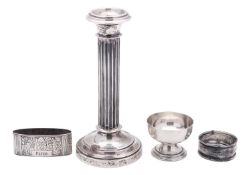 A small mixed lot of silver, comprising of an early 20th century Dutch silver candlestick,