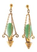 A pair of jade chandelier earrings, each earring suspending three sections of chain,