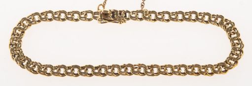A fancy link bracelet, of double links, push in clasp, figure of eight catch & safety chain,