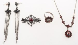 A mixed group of jewellery, including a Bohemian garnet necklace, unmarked white metal,