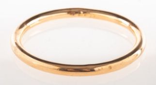 An antique 9ct gold bangle, a hollow circular bangle, indistinct hallmarks and makers mark for 9 .
