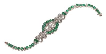 An emerald and diamond bracelet, of Art Deco style, of geometric and ribbon design,