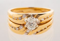 A combined diamond engagement ring and diamond band,