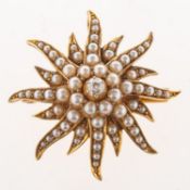 A Victorian pearl and diamond starburst brooch pendant,