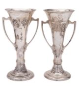 A pair of Edwardian Art-Nouveau silver vases, with trumpet shaped bodies,