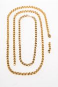 A Victorian chain necklace, (split into three lengths),