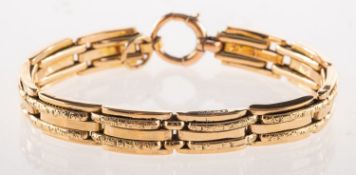 A gate style stretch link bracelet, three row polished links,