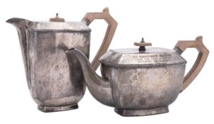 A George VI Art Deco silver tea pot & matching hot water jug, of panelled form,