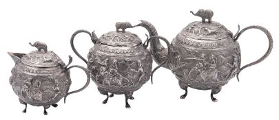 A late 19th/ early 20th century Far-Eastern three-piece silver tea set, circular form,