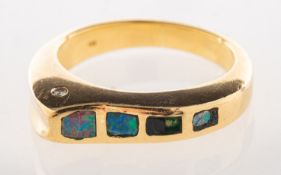 An opal and diamond ring, the modern ring of curved design,