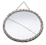 A 20th century continental mirror, shaped circular outline,