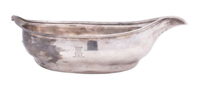 A George III silver pap boat, shaped oval outline and with a reeded handle, makers mark worn,