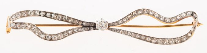 An Edwardian diamond bow brooch,