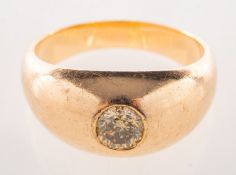 A diamond gypsy ring, collet set with a brilliant-cut diamond of fancy light brown in colour,