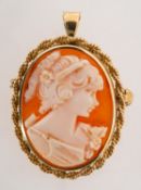 A cameo brooch pendant, the carved cameo depicting a lady, with a plain and rope twist mount,