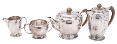 A 20th century four-piece silver tea set, of circular form,