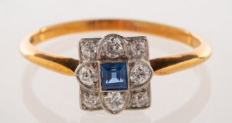 An Art Deco diamond and sapphire ring, of geometric form,