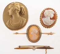 Three cameo brooches and one other brooch, including a bar brooch,