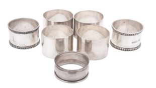 Seven silver napkin rings, by different makers & dates; 6.