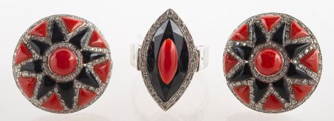 An Art Deco style onyx, coral and diamond ring and a pair of similar onyx,