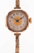 A 9K gold lady's wristwatch the gilt dial having black Roman numerals and blued-steel spade hands