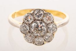 An Art Deco diamond daisy ring,