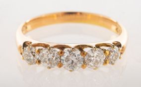A five stone diamond ring, claw set with five graduated old-cut diamonds, diamonds approx. 0.