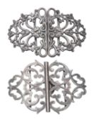 A late Victorian silver nurses buckle, with foliate scroll decoration, Reynolds & Westwood,