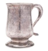 A George II North Country provincial silver mug, of baluster form, with an 