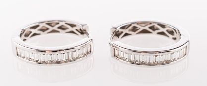 A fine pair of 18ct gold 1.35 carats diamond hoop earrings