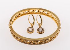 Saks Fifth Avenue, A diamond bangle and a pair of diamond earrings,