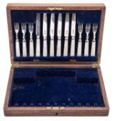 A George V cased set of six pairs of silver dessert knives & forks,