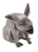 A modern solid silver figure of a seated pig, with a textured finish makers mark possibly 
