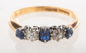 A sapphire and diamond ring,
