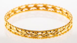 An openwork bangle, (possibly of Indian origin),