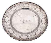 A Victorian silver dish or stand, circular outline,