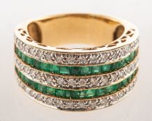 A wide designed band set with diamonds and emeralds, a graduated wide band,