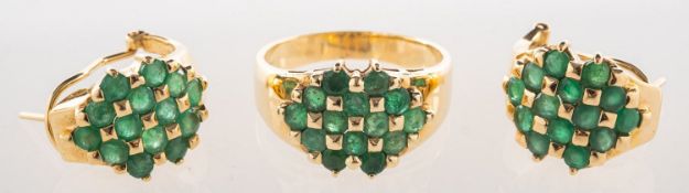 An emerald ring and matching emerald earrings,