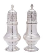 A pair of modern silver sugar casters,