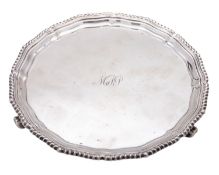 A 20th century small silver salver, of shaped circular outline,